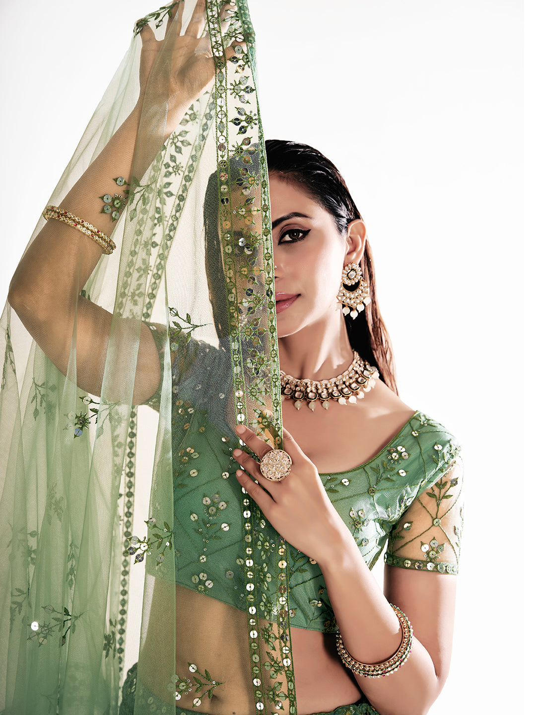 Pista Green Sequins Embroidered Net Lehenga Choli