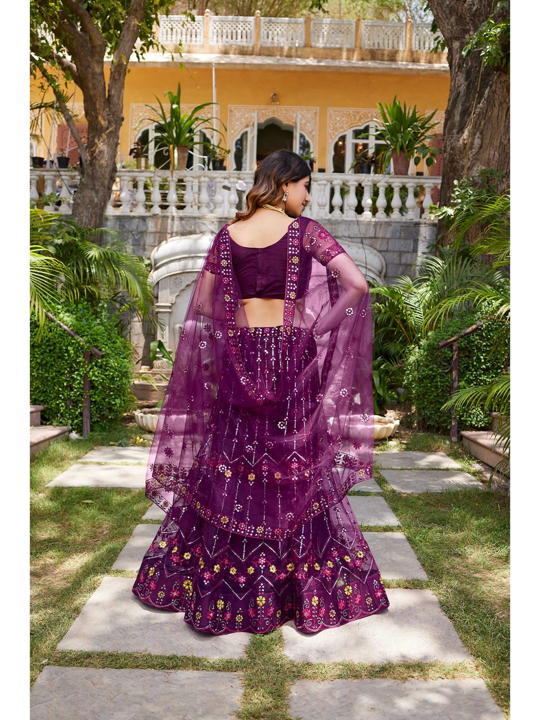 Purple Sequins Embroidered Net Lehenga Choli