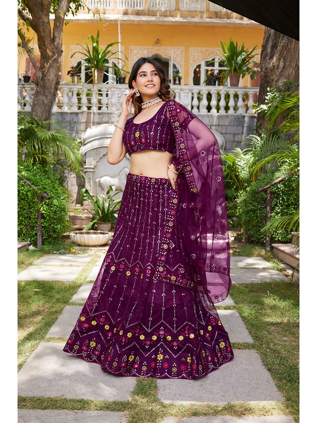 Purple Sequins Embroidered Net Lehenga Choli