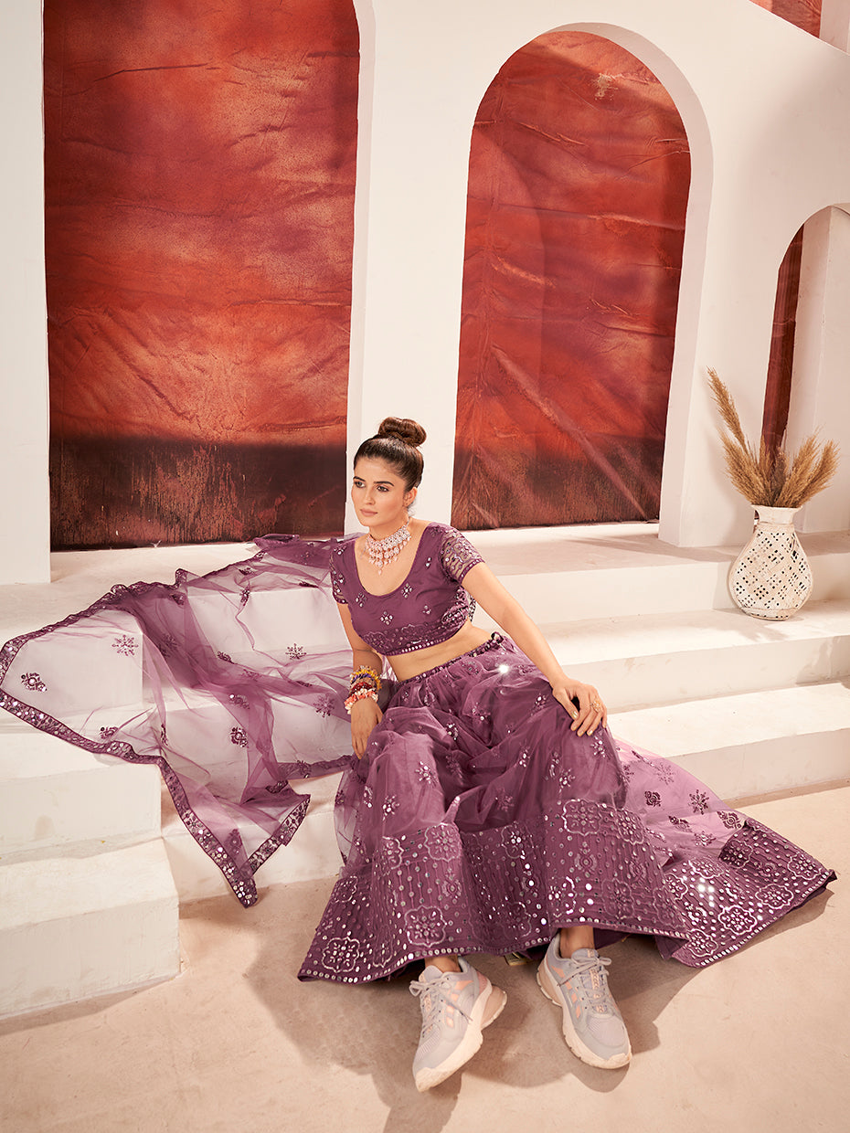 Prettiest Mauve Soft Net Sequins Embroidered Lehenga Choli