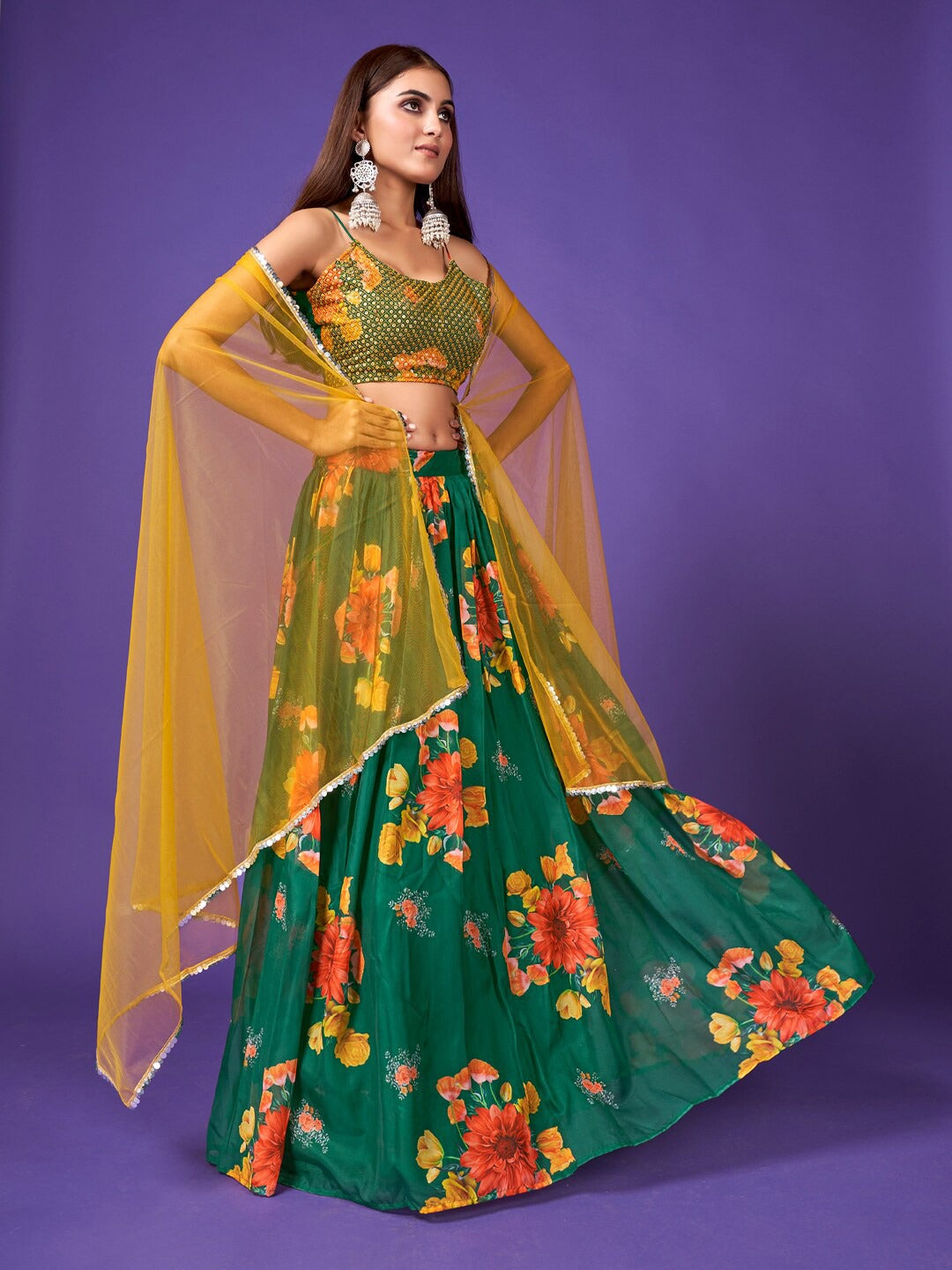 Graceful Green Lehenga & Blouse With Plain Yellow Dupatta .