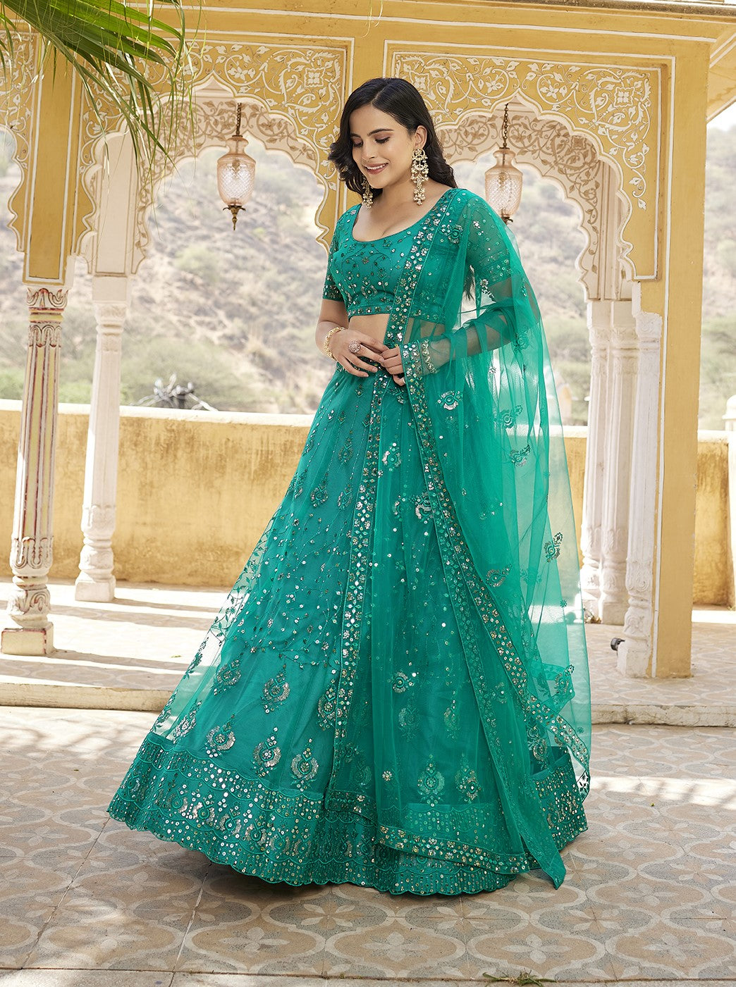 Rama Blue Sequins Embroidered Net Lehenga Choli