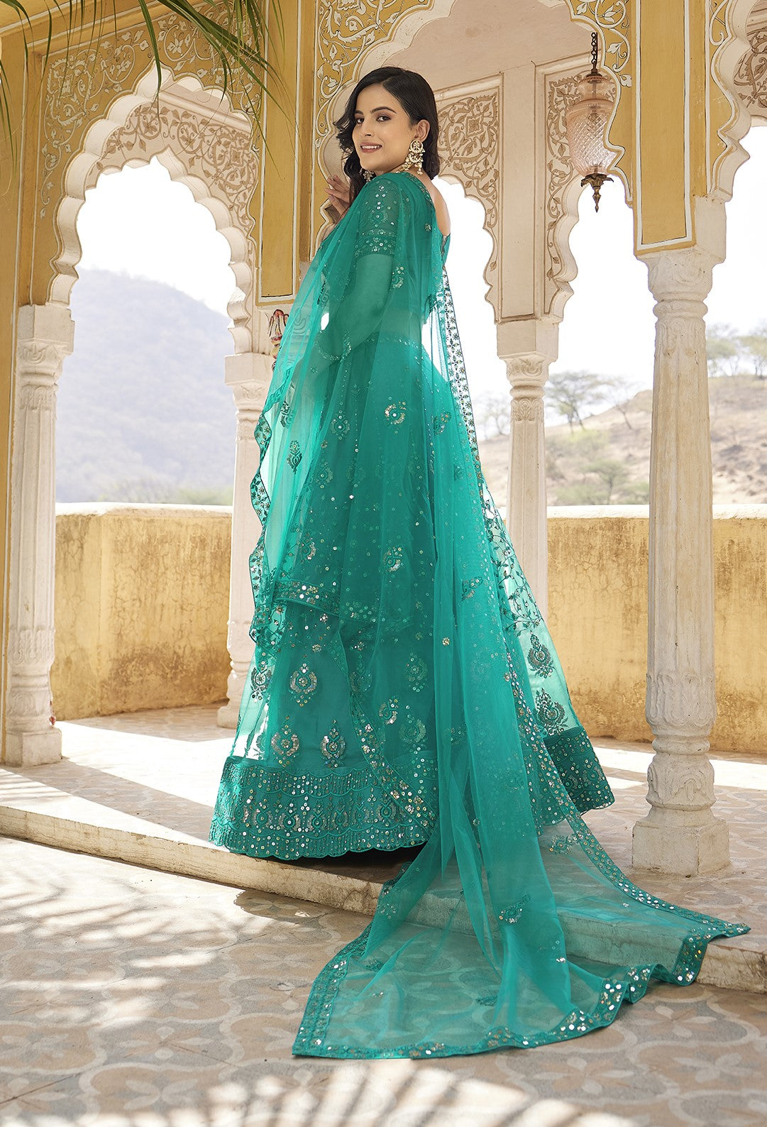 Rama Blue Sequins Embroidered Net Lehenga Choli