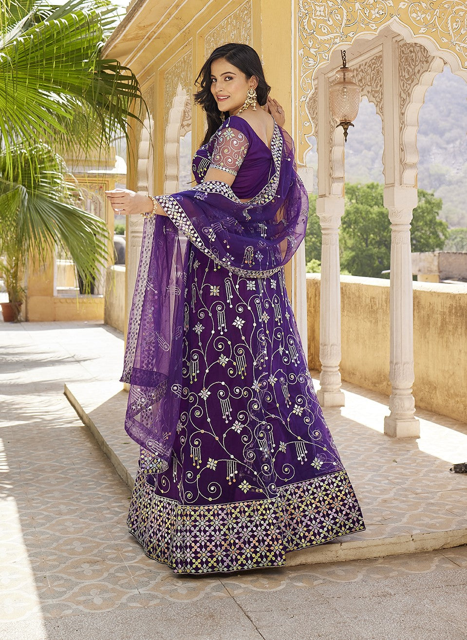 Purple Sequins Embroidered Net Lehenga Choli