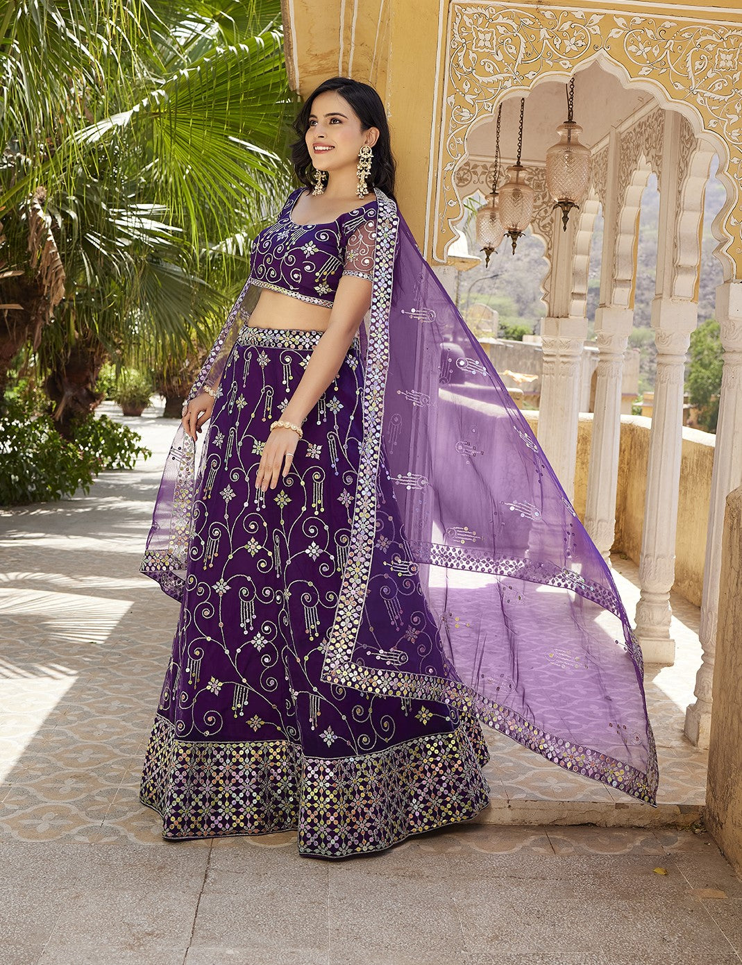 Purple Sequins Embroidered Net Lehenga Choli