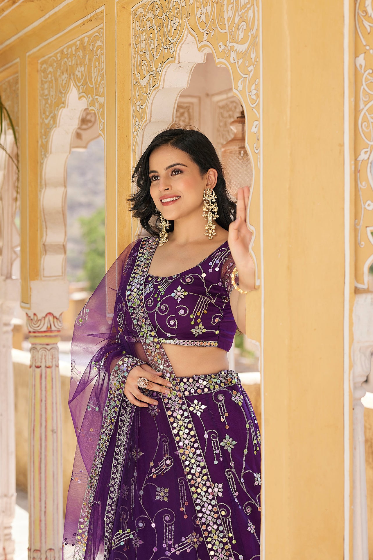 Purple Sequins Embroidered Net Lehenga Choli