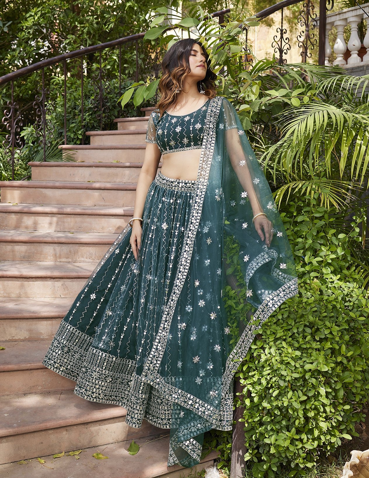 Fancy Green Soft Net Sequins Embroidered Lehenga Choli