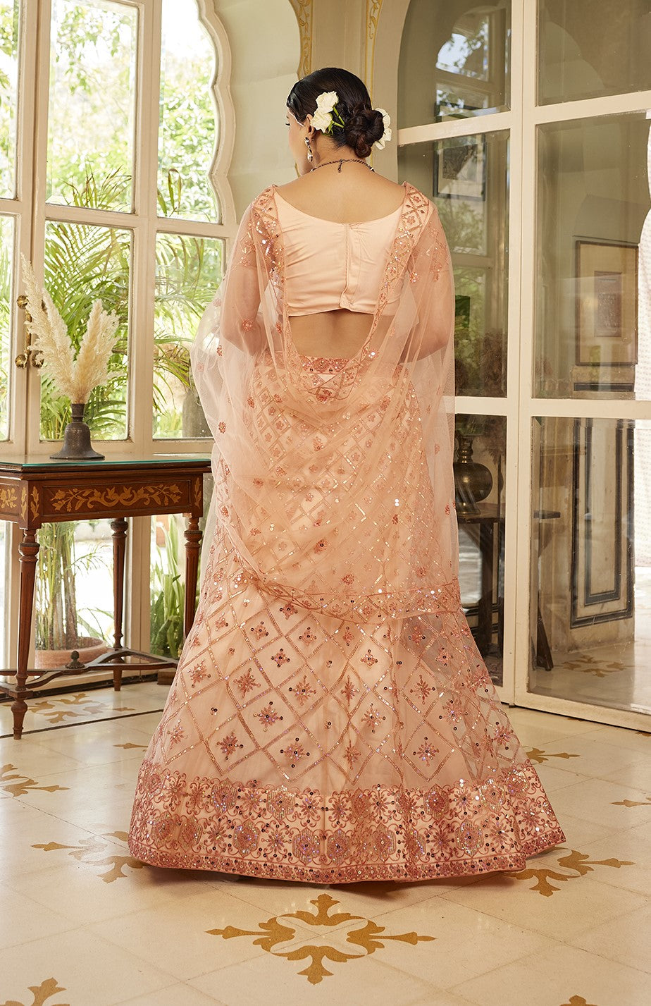 Fancy Peach Sequins Embroidered Net Lehenga Choli