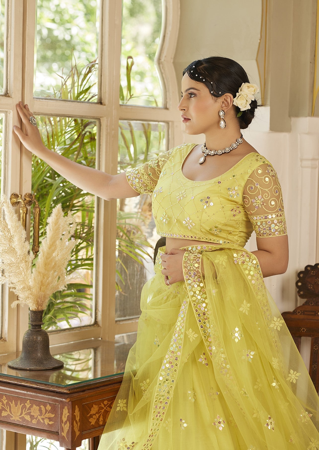 Light Yellow Sequins Embroidered Net Lehenga Choli