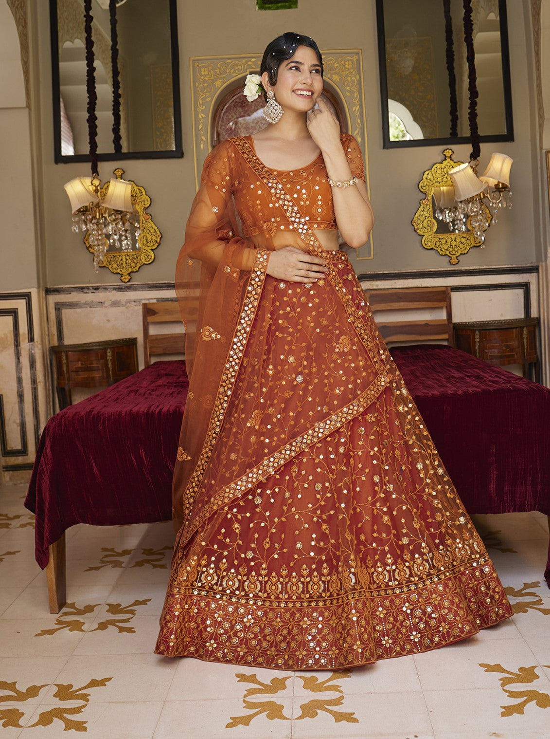 Orange Soft Net Sequins Embroidered Lehenga Choli