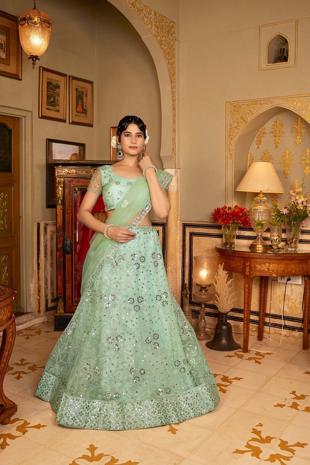 Sea Green Sequins Embroidered Net Lehenga Choli