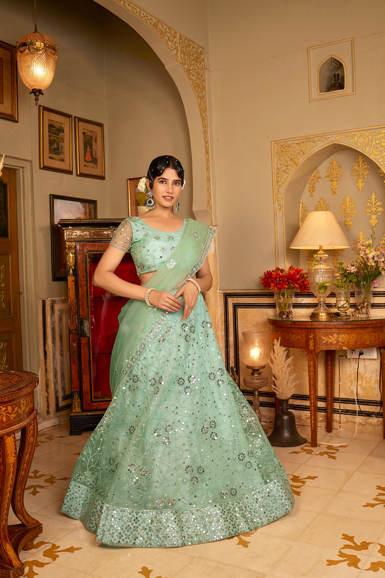 Sea Green Sequins Embroidered Net Lehenga Choli