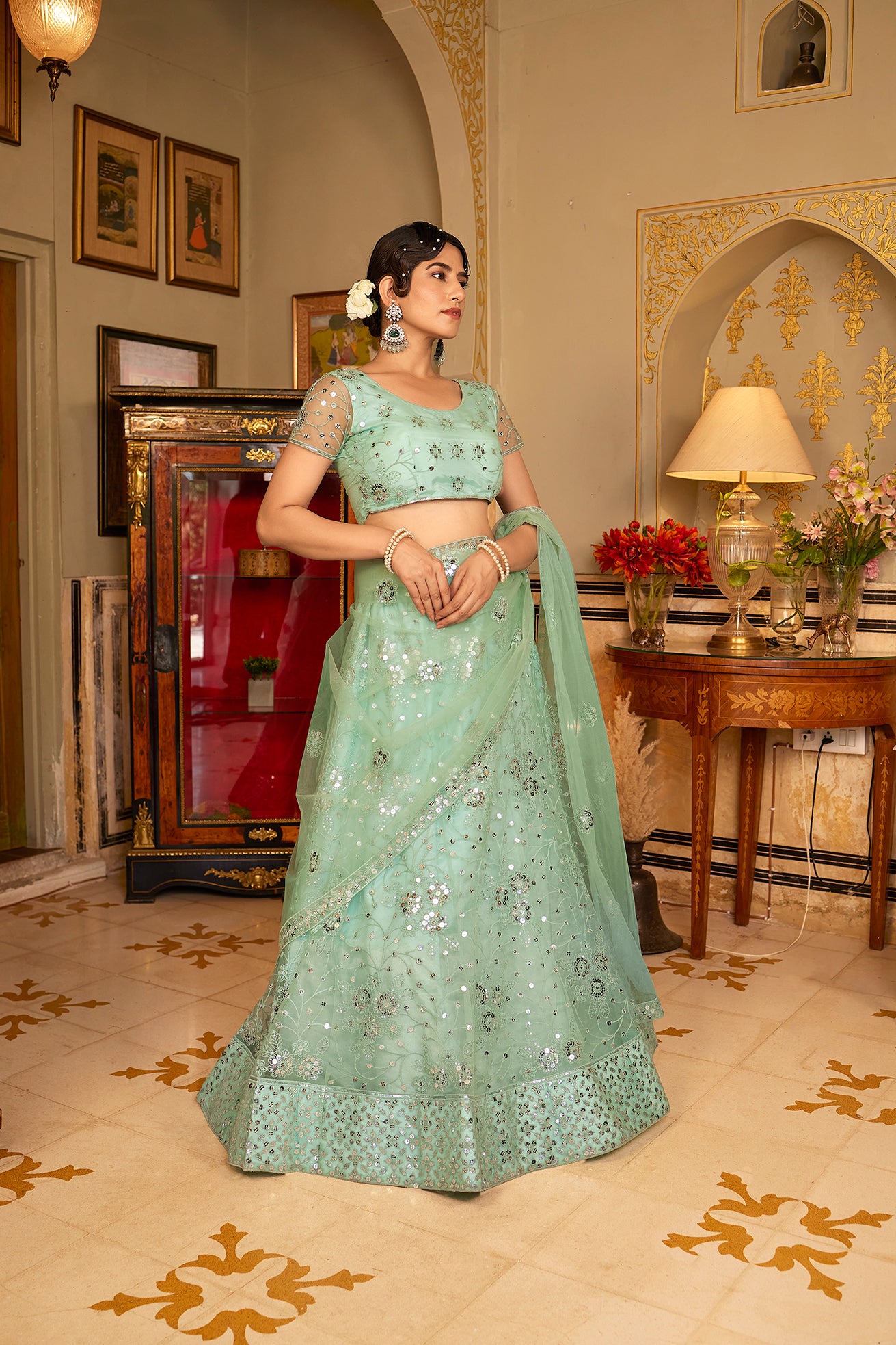 Sea Green Sequins Embroidered Net Lehenga Choli