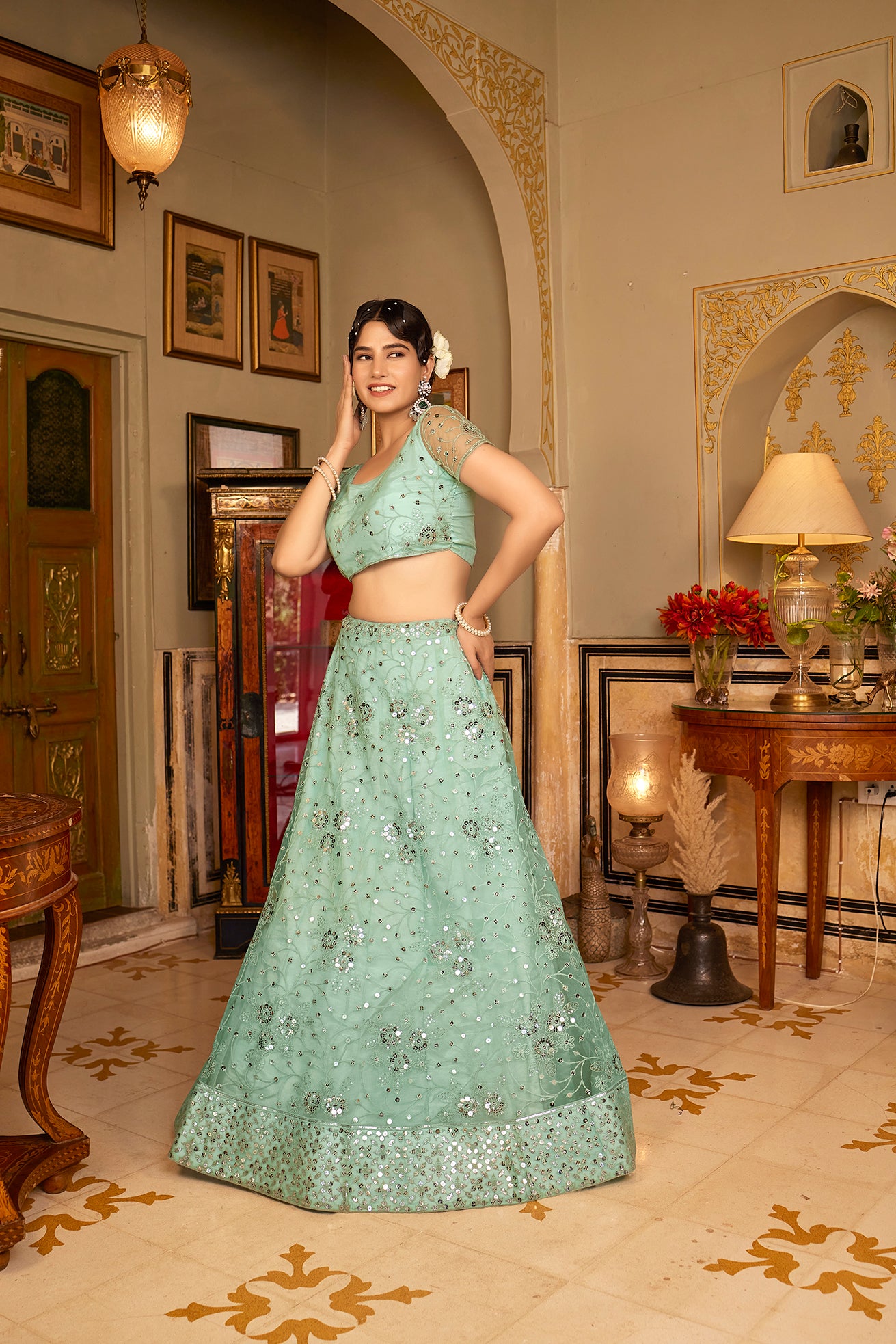 Sea Green Sequins Embroidered Net Lehenga Choli