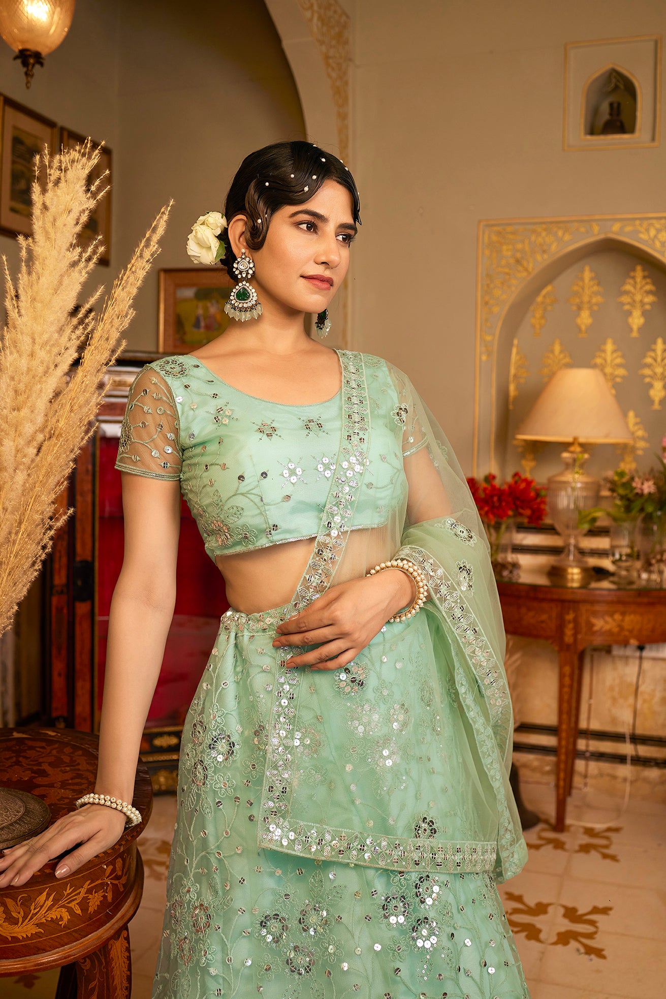 Sea Green Sequins Embroidered Net Lehenga Choli