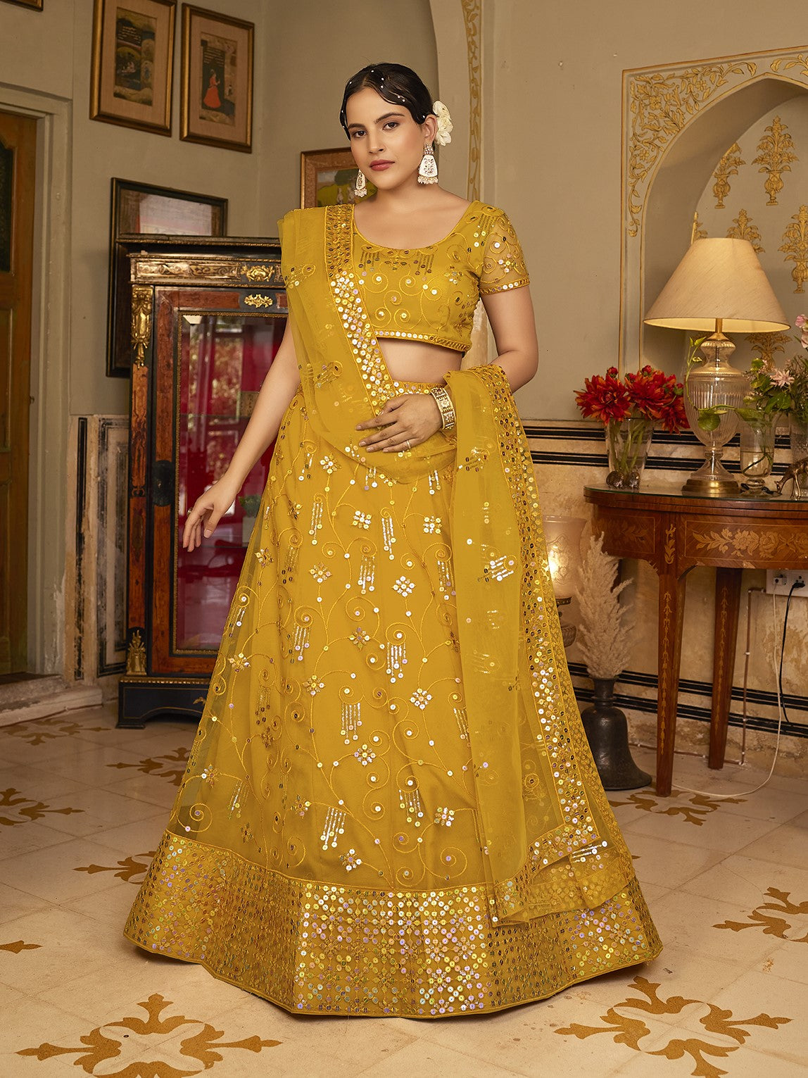 Deep Yellow Sequins Embroidered Net Lehenga Choli