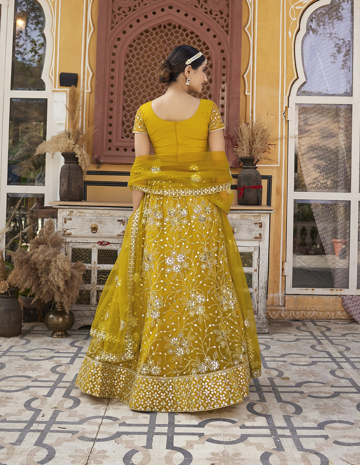 Mustard Yellow Sequins Embroidered Net Lehenga Choli