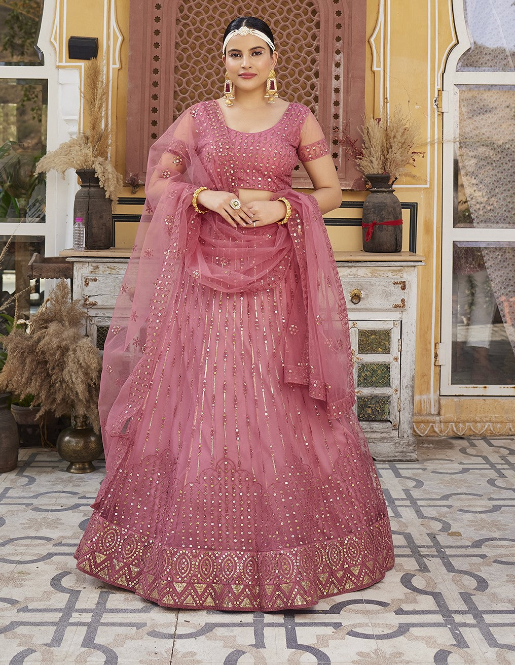 Rose Pink Sequins Embroidered Net Lehenga Choli