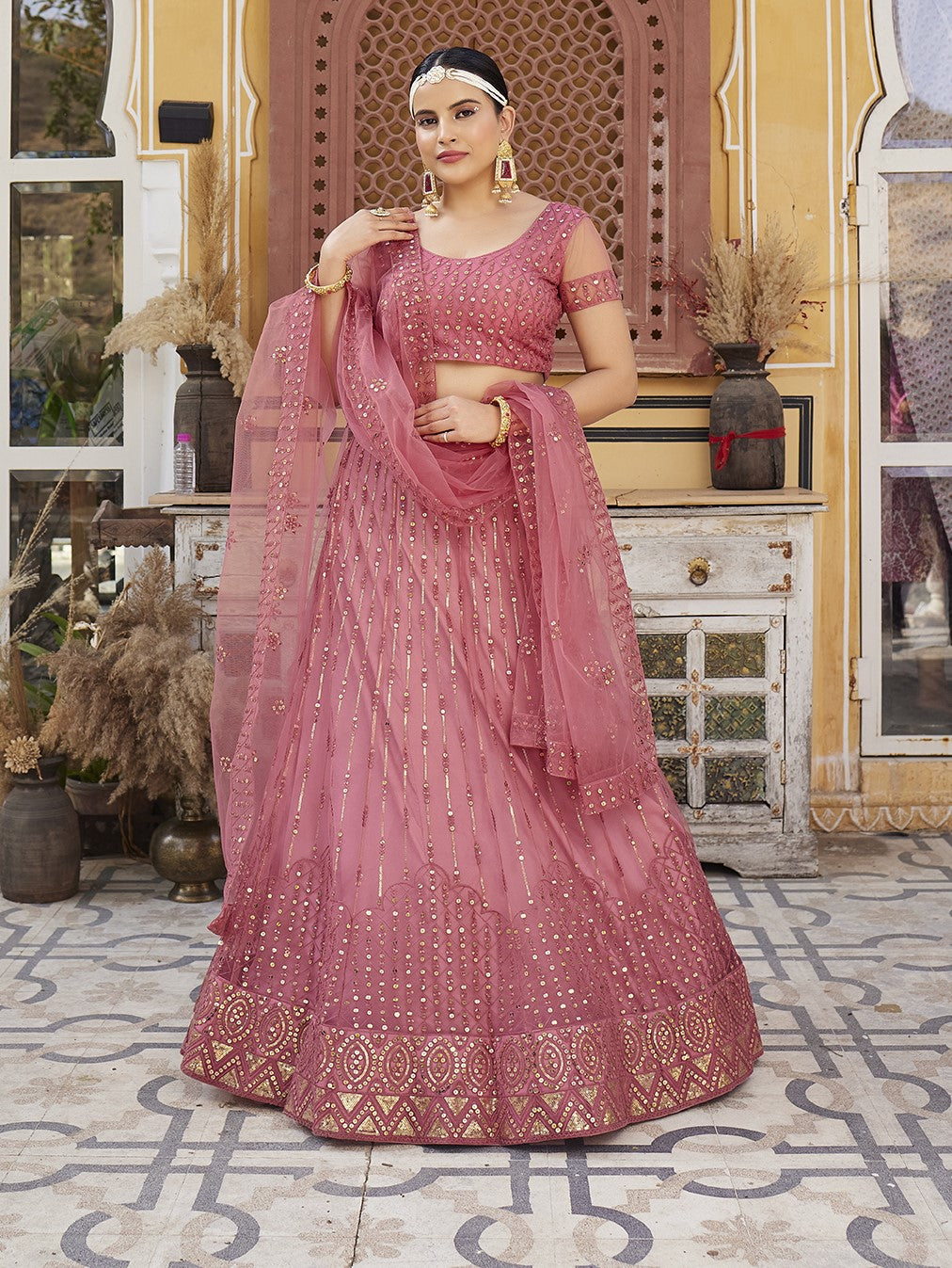 Rose Pink Sequins Embroidered Net Lehenga Choli