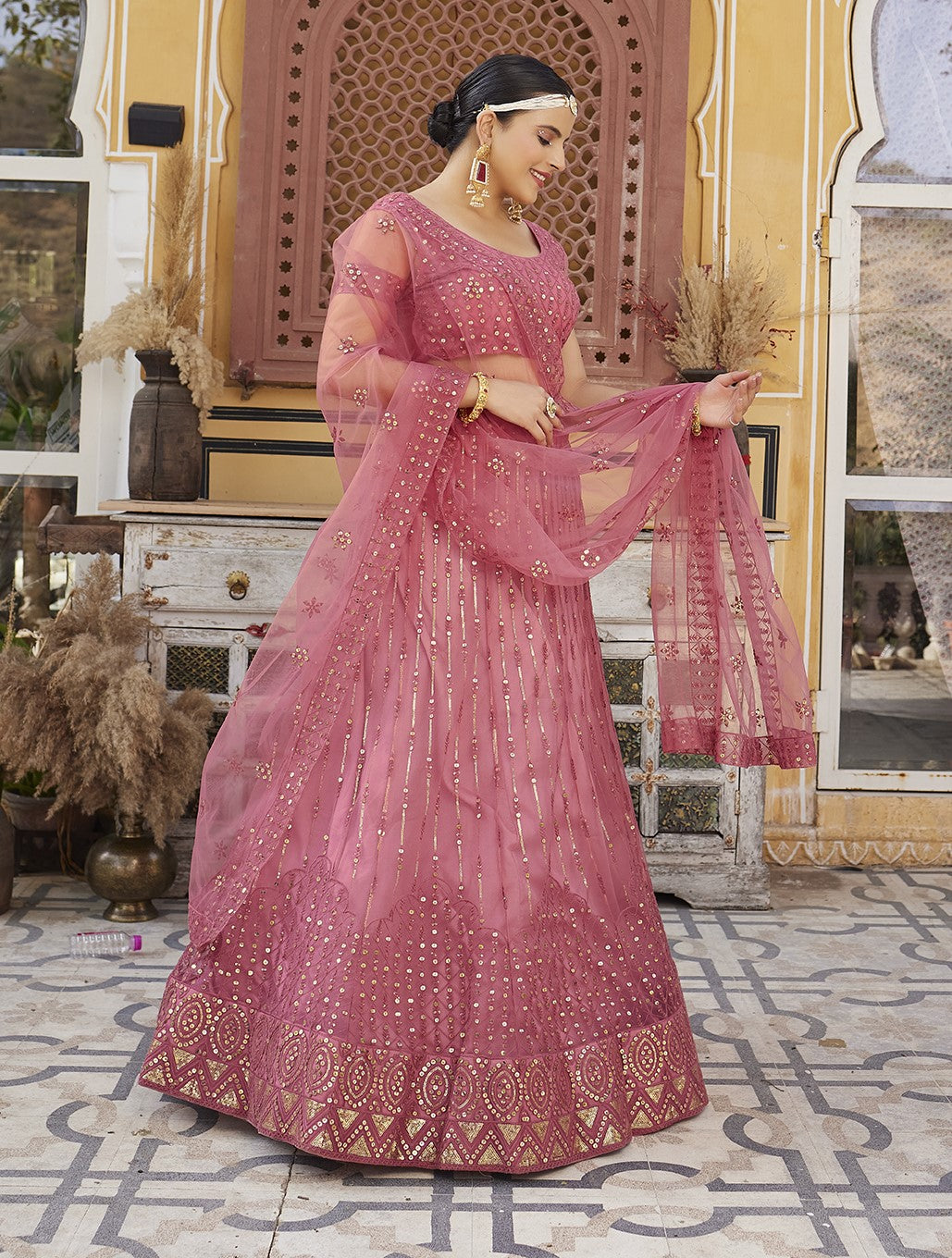 Rose Pink Sequins Embroidered Net Lehenga Choli