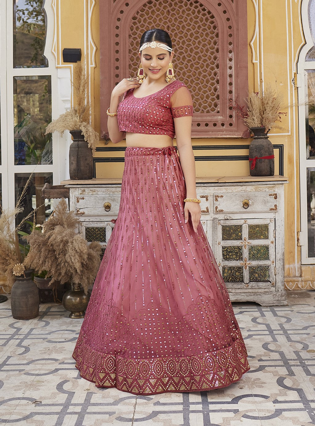 Rose Pink Sequins Embroidered Net Lehenga Choli