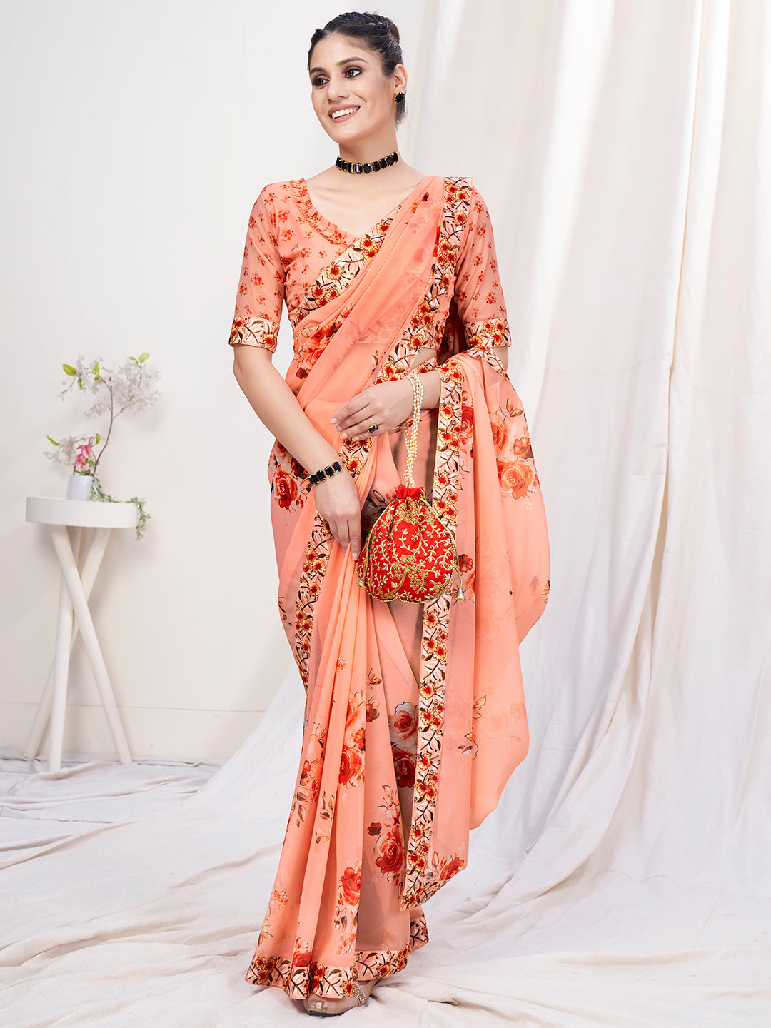 Pastel Orange Floral Designer Georgette Saree