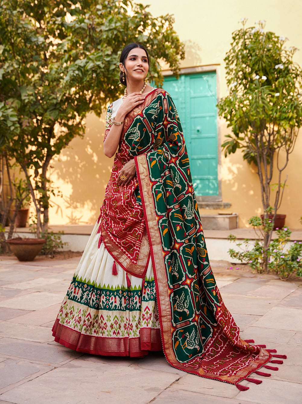 White & Green Patola Silk Lehenga Choli With Contrast Dupatta