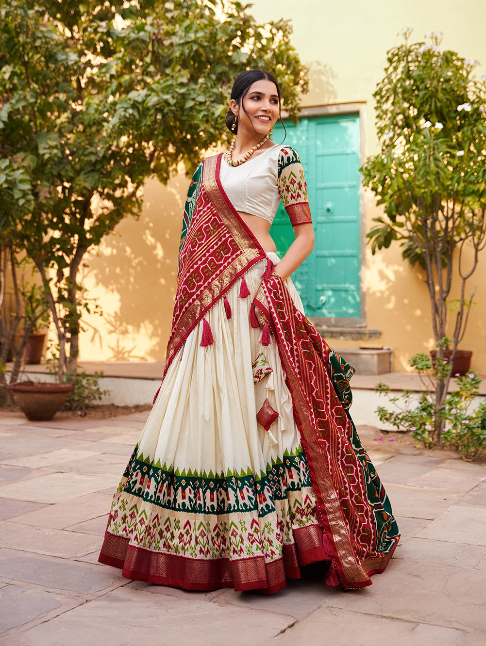 White & Green Patola Silk Lehenga Choli With Contrast Dupatta