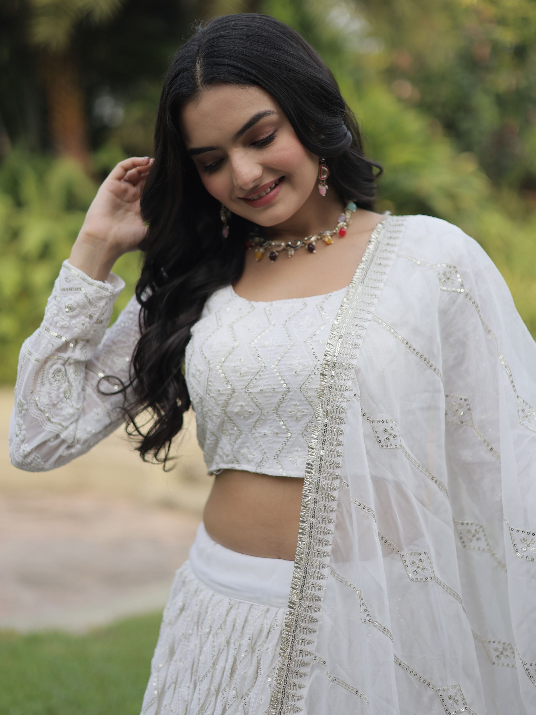 Enchanting White Embroidered Georgette Occasion Wear Lehenga Choli