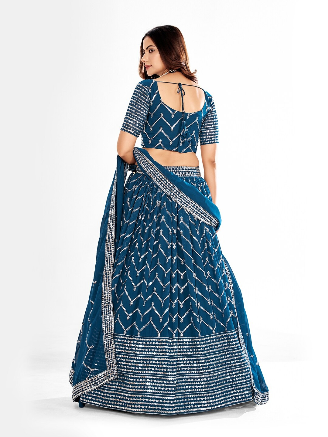 Blue Embroidered Sequined Semi-Stitched Lehenga Choli