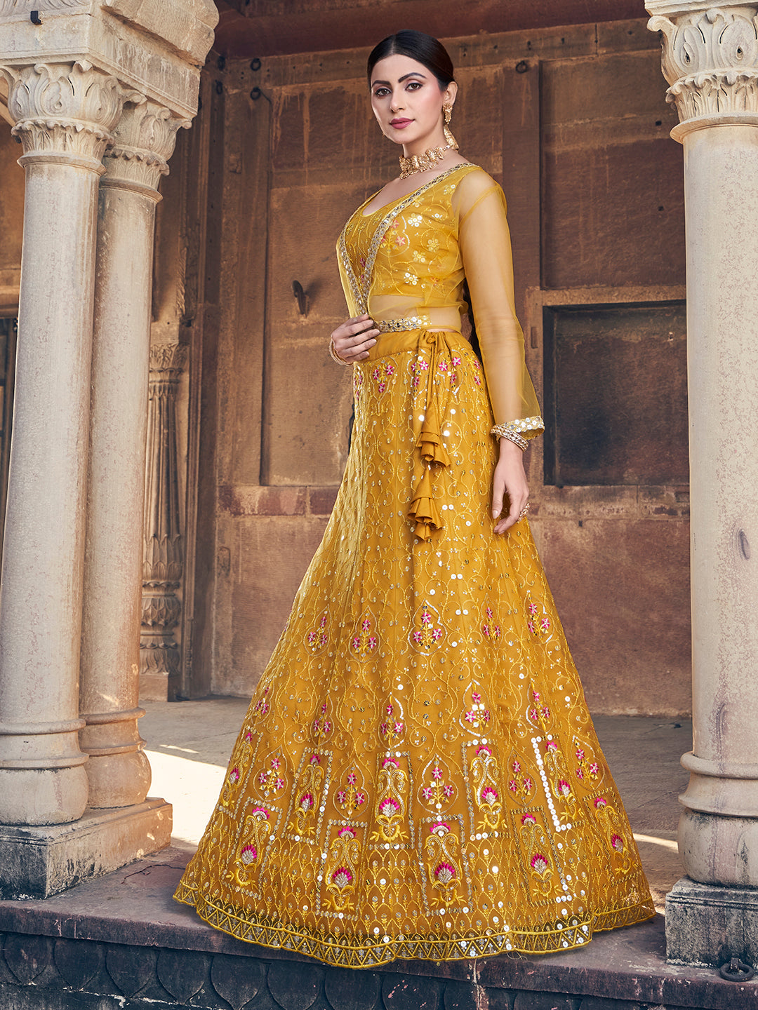 Desirable Mustard Yellow Soft Net Sequence Embroidered Eid Special Lehenga Choli