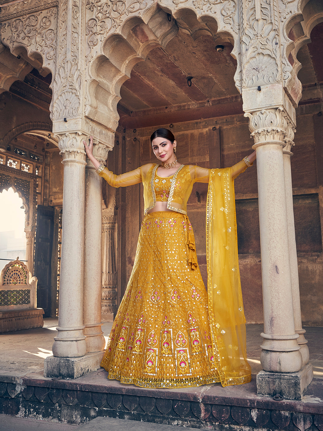 Desirable Mustard Yellow Soft Net Sequence Embroidered Eid Special Lehenga Choli