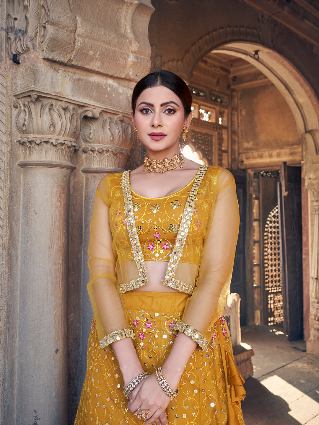 Desirable Mustard Yellow Soft Net Sequence Embroidered Eid Special Lehenga Choli