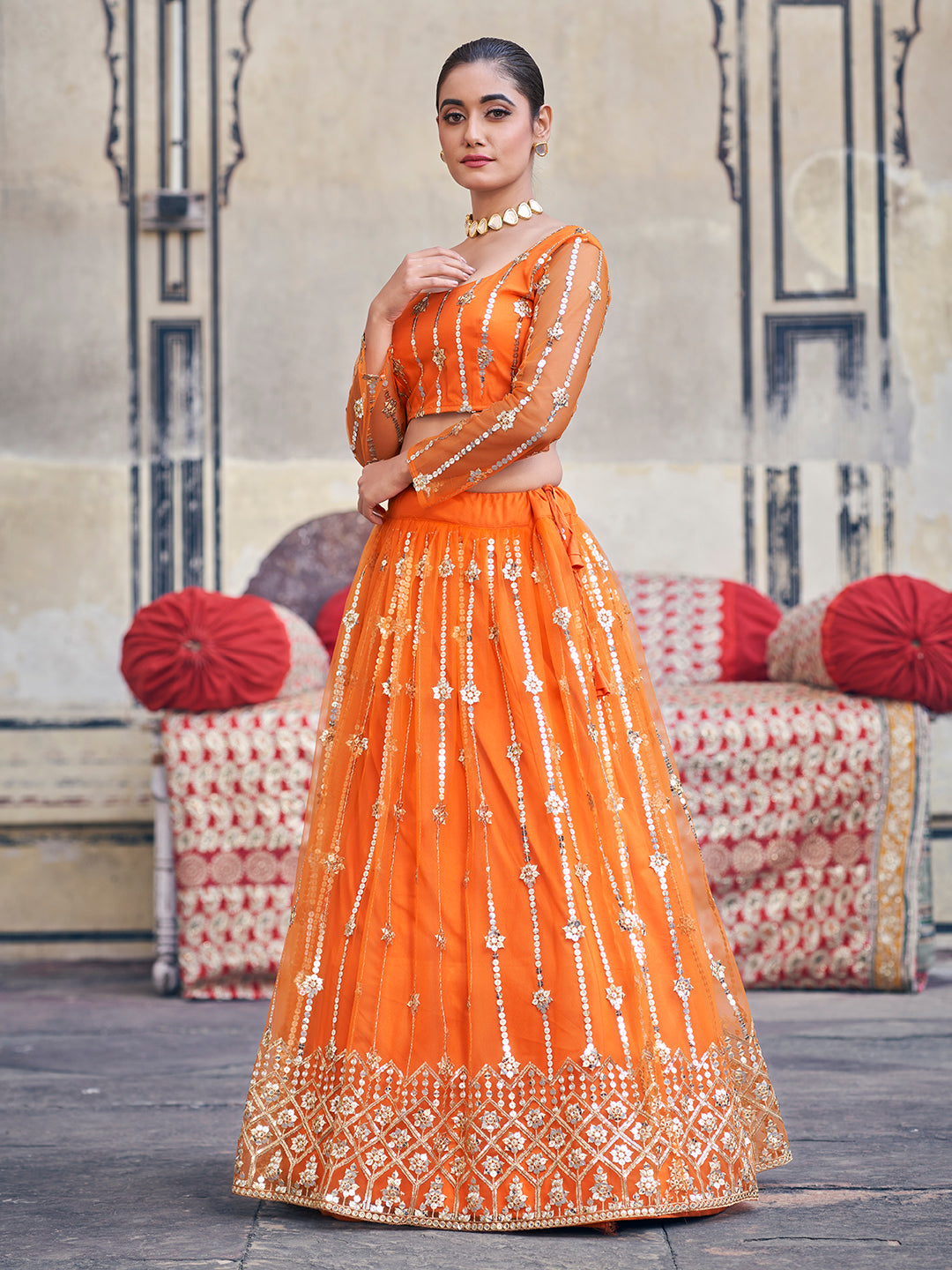 Stunning Orange Sequence Embroidered Soft Net Party Wear Lehenga Choli For Women