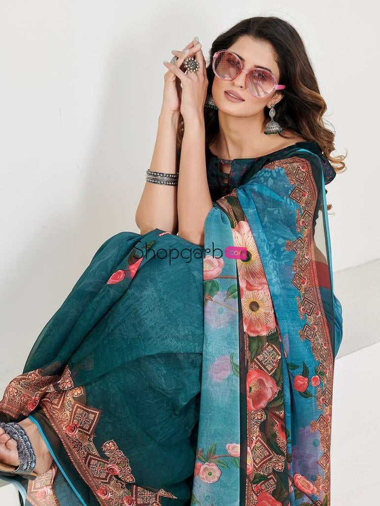 Delightful Teal Georgette Printed Casual Wear Saree With Blouse